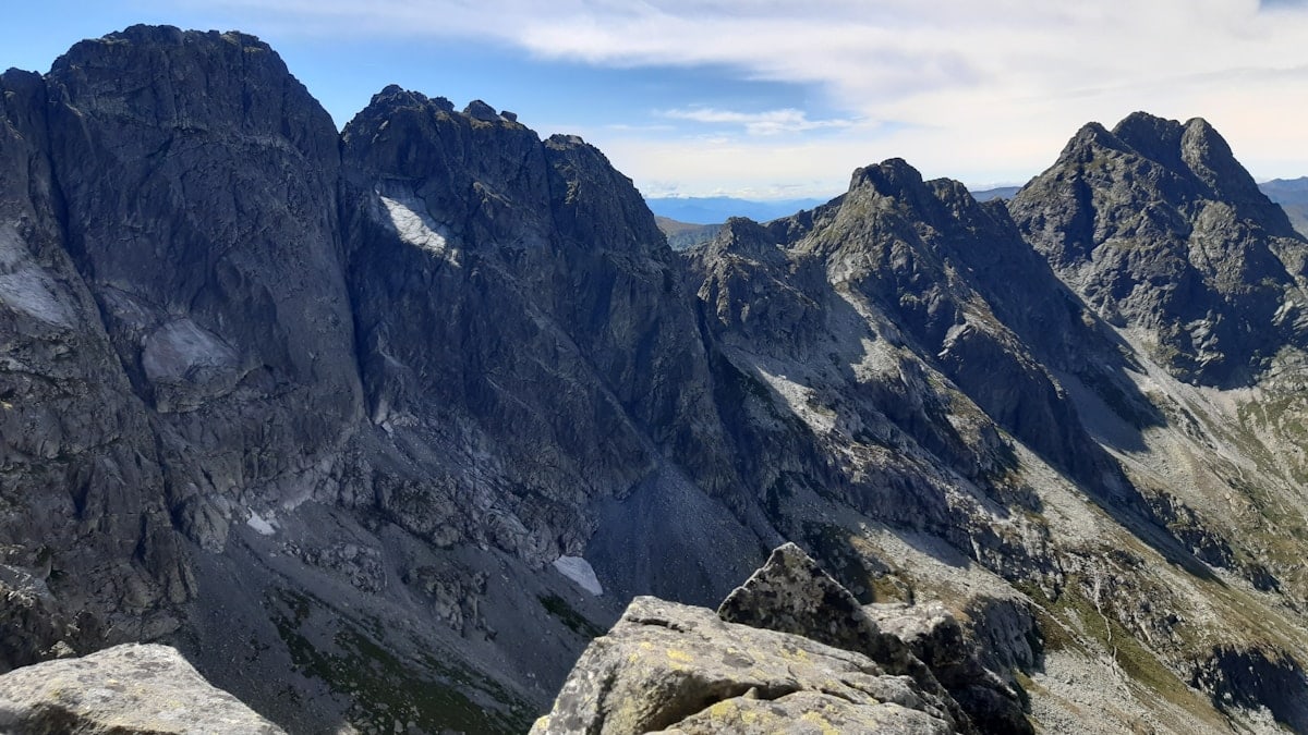 a view of a mountain range from the top of a mountain
